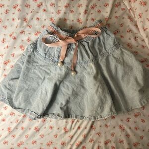 coquette baby blue skirt with light pink ribbon and pearls